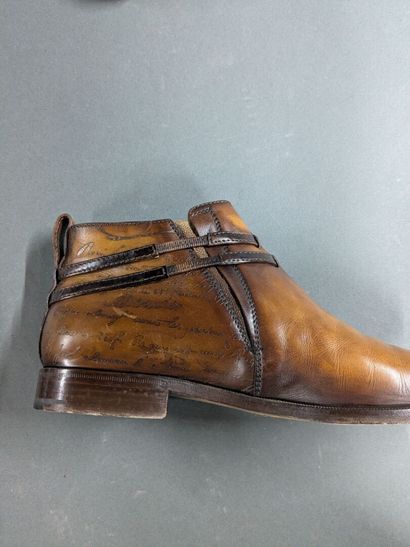 BERLUTI
Pair of men's high-top leather shoes,...