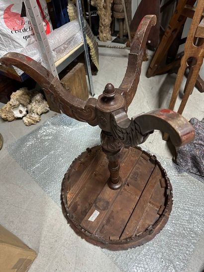 Carved natural wood side table with a painted...