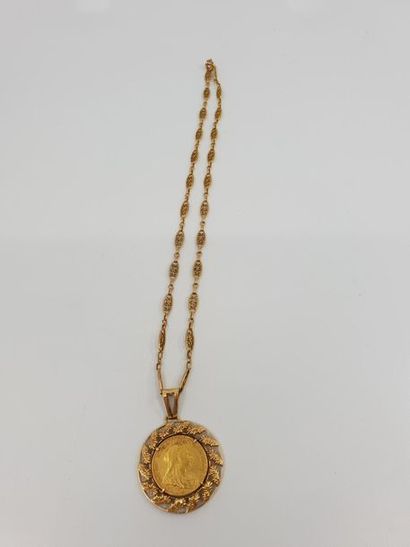COLLIER en or jaune 750° accompagnée d'un...