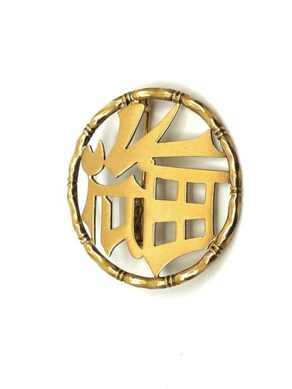 BROCHE en or jaune 750° faisant pendentif...