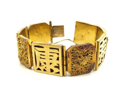 IMPORTANT BRACELET en or jaune 750° se composant...