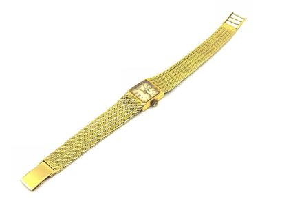 LUXE 
Montre bracelet de dame en or jaune...