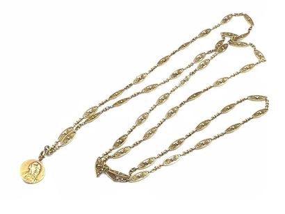 IMPORTANT sautoir 
En or jaune 750° maille...