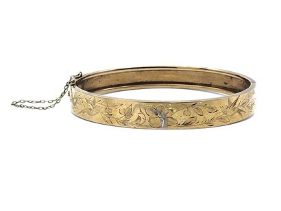 BRACELET 
Jonc en or jaune 750° ouvrant,...