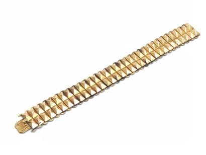 BRACELET 
En or jaune 750° motif pointe de...