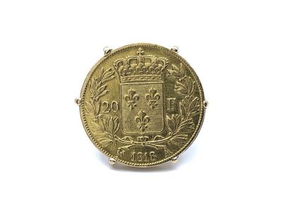 BAGUE 
En or jaune 750° ornée d'une pièce...