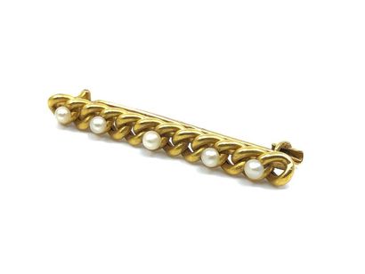 BROCHE en or jaune 750° ornée de perles 
Poids...