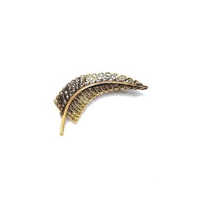 BROCHE en or jaune 750° à motif feuillagé...
