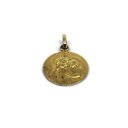 MEDAILLE religieuse en or jaune 750° 
Poids...
