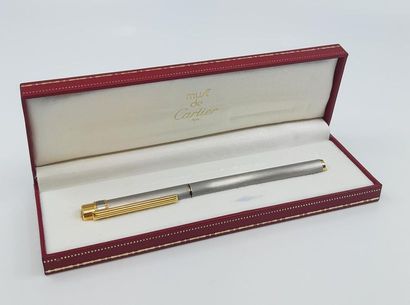 MUST Cartier
Stylo en acier brossé 
Dans...