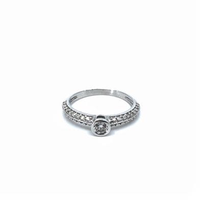 BAGUE 
en or gris 750° ornée d'un diamant...