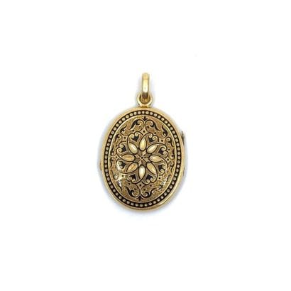 PENDENTIF 
porte souvenir en or jaune 750°...