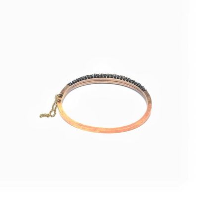 BRACELET en or rose orné de pierres blanches...
