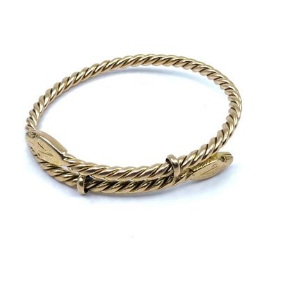 BRACELET torsadé
en or jaune 750° représentant...