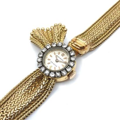 MOVADO
Montre bracelet de dame en or jaune...