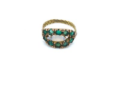 BAGUE en or jaune 750° ornée d'émeraudes...