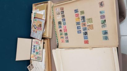 A green empty ALBUM with stamps on loose...