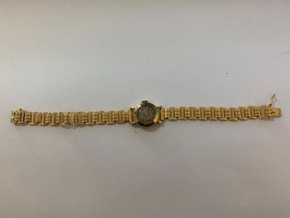 MONTRE bracelet de dame en or jaune 750°...
