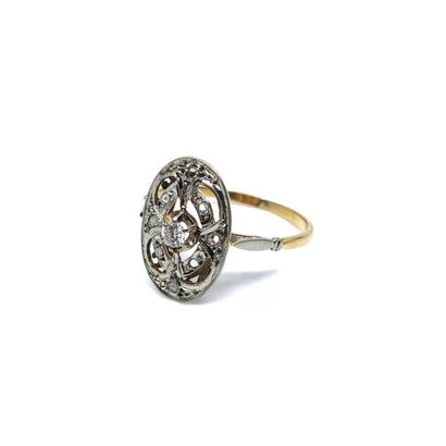 TRAVAIL Français
BAGUE en or deux tons 750°,...