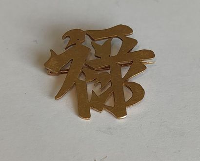 BROCHE en or jaune 750° à motifs d'idéogrammes...