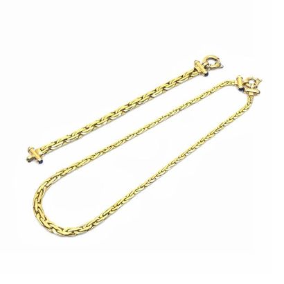 PARURE en or jaune 750° comprenant :
Bracelet...