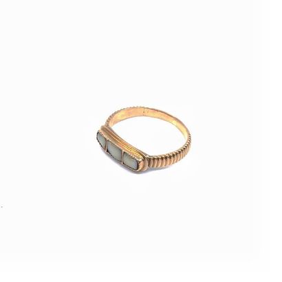BAGUE jarretière en or jaune 750° ornée d'os...