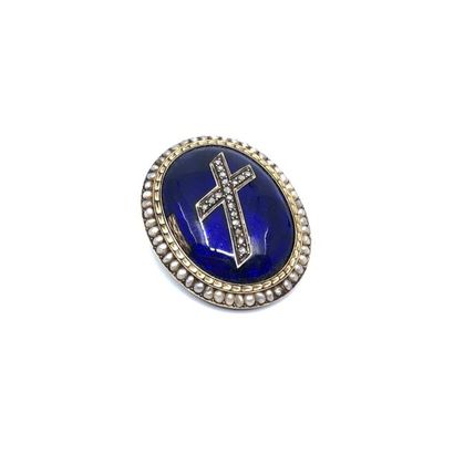 BROCHE en or 750° et argent circulaire ornée...