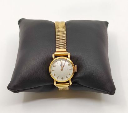 LIP 
Montre en or jaune 750° 
Poids brut...