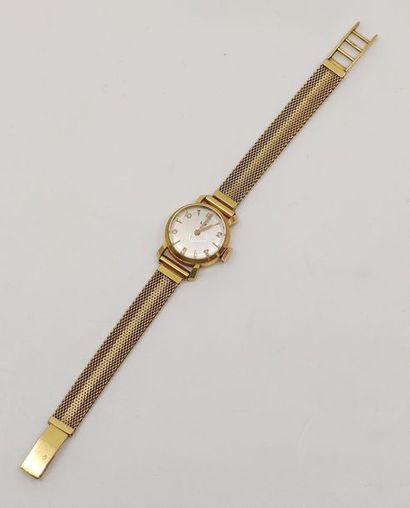 LIP 
Montre en or jaune 750° 
Poids brut...