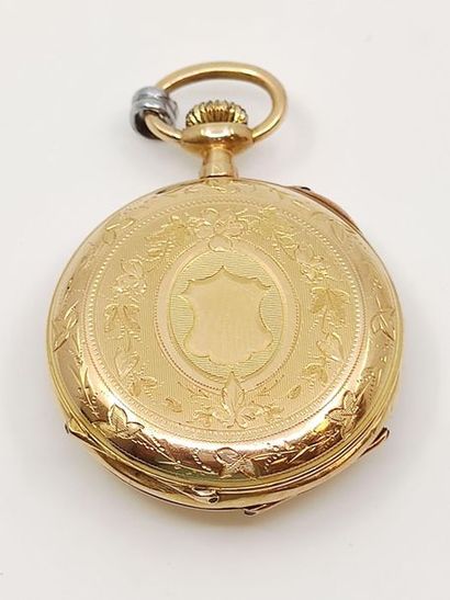 MONTRE de col en or jaune 750° 
Poids brut...