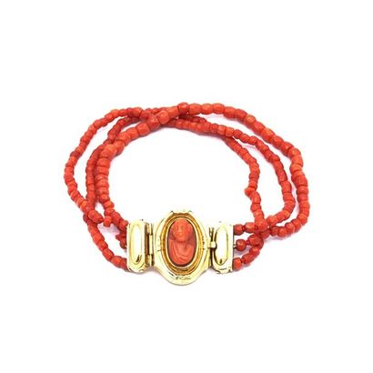 BRACELET in coral three rows 750° yellow...