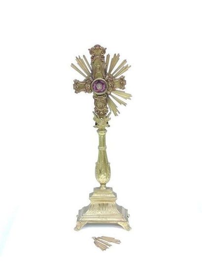 RELIQUARIAN CROSS in gilded metal applied...