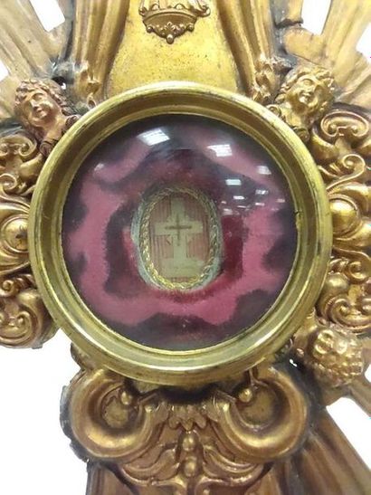RELIQUARIAN CROSS in gilded metal applied...