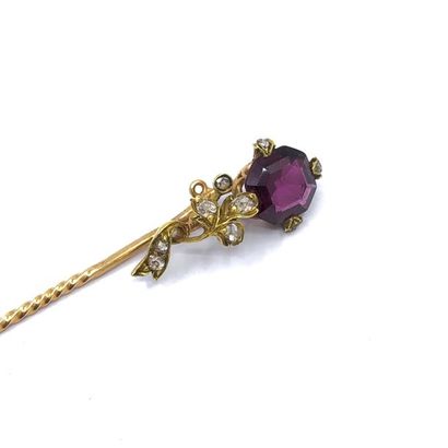 Pin with tie decorated with an octagonal...