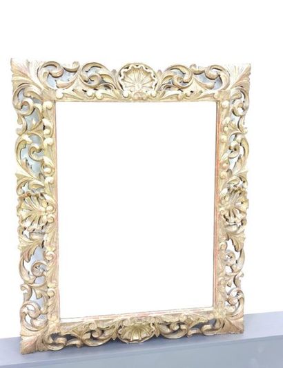 LARGE MIRROR in carved gilded oak decorated...