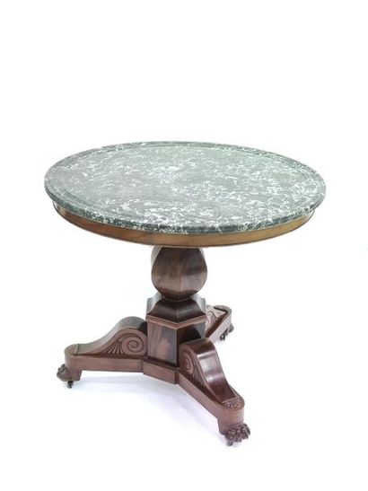 GUERIDON in mahogany and mahogany veneer,...