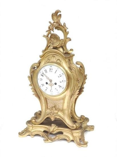 HANGING in gilt bronze, enamelled dial with...