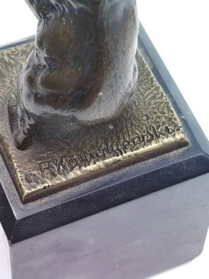 Pair of bronze fighting bears on a square...