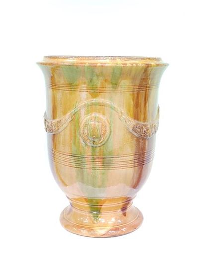 VASE on a yellow-brown enamelled terracotta...