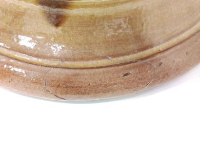 VASE on a yellow-brown enamelled terracotta...