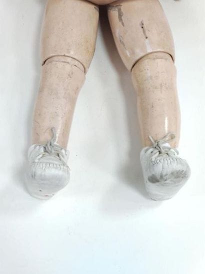 DOLL, porcelain head, fixed blue sulphide...