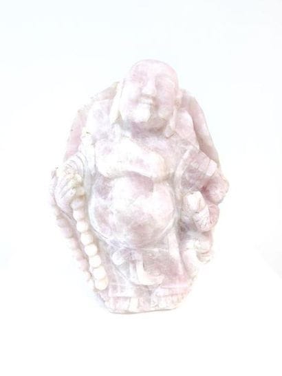 Statue of a laughing Buddha in pink quartz
H...