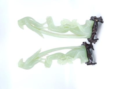 Pair of green hard stone sculpture representing...