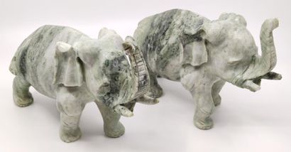 Pair of hard stone sculptures representing...