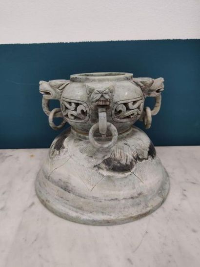 Part of a perfume burner made of green hard...