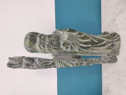 Wise man standing in hard stone with a stick...