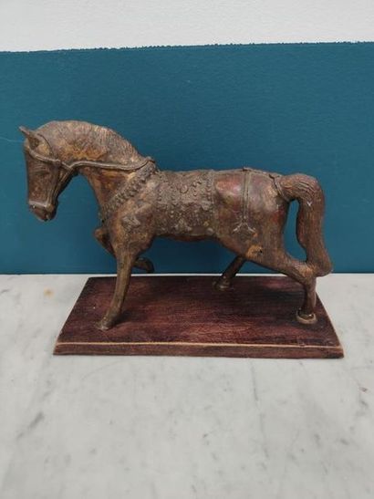 BRONZE with a gold patina, formerly polychrome...