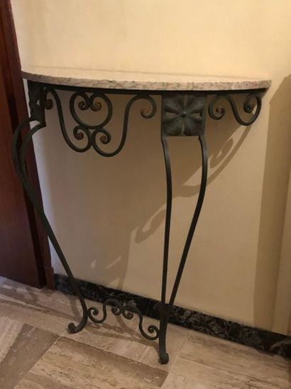Wrought iron wall bracket with beige veined...