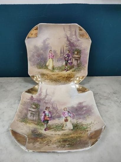 TWO square plates in polychrome porcelain...