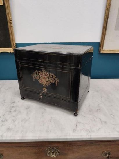 Liqueur cellar in blackened wood and brass...